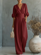 Mono elegante con escote en V y talle alto