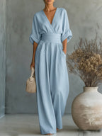 Mono elegante con escote en V y talle alto