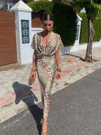 Covadonga • Vestido Midi Estampado Animal Print con Nudo Frontal