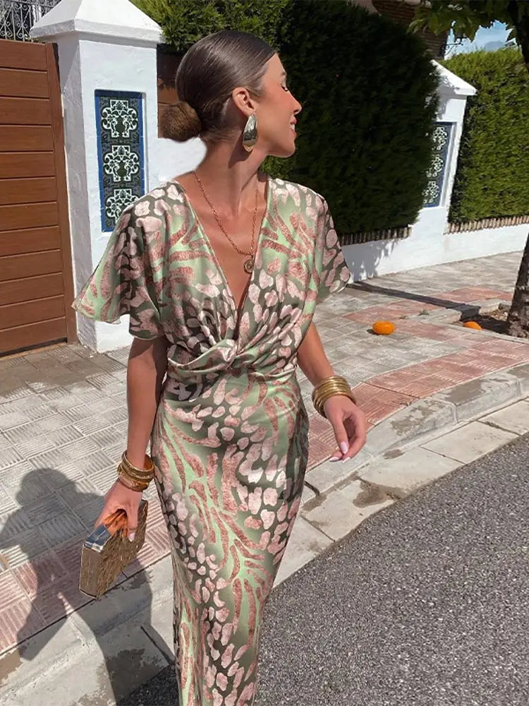 Covadonga • Vestido Midi Estampado Animal Print con Nudo Frontal