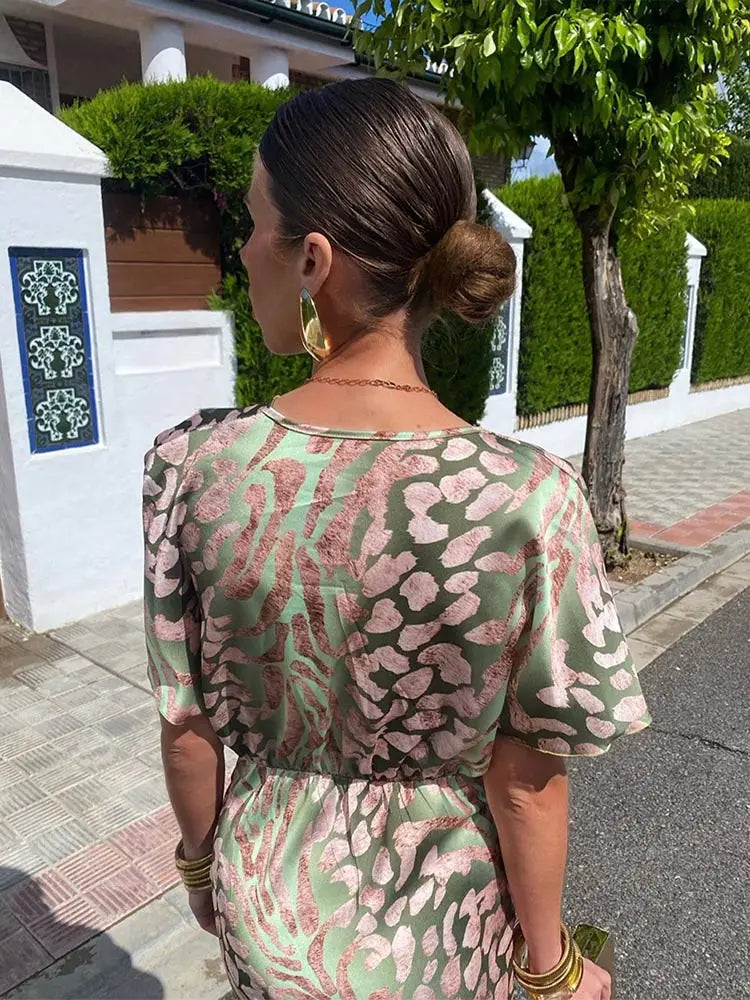 Covadonga • Vestido Midi Estampado Animal Print con Nudo Frontal
