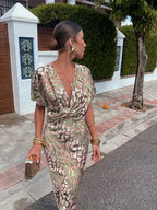 Covadonga • Vestido Midi Estampado Animal Print con Nudo Frontal