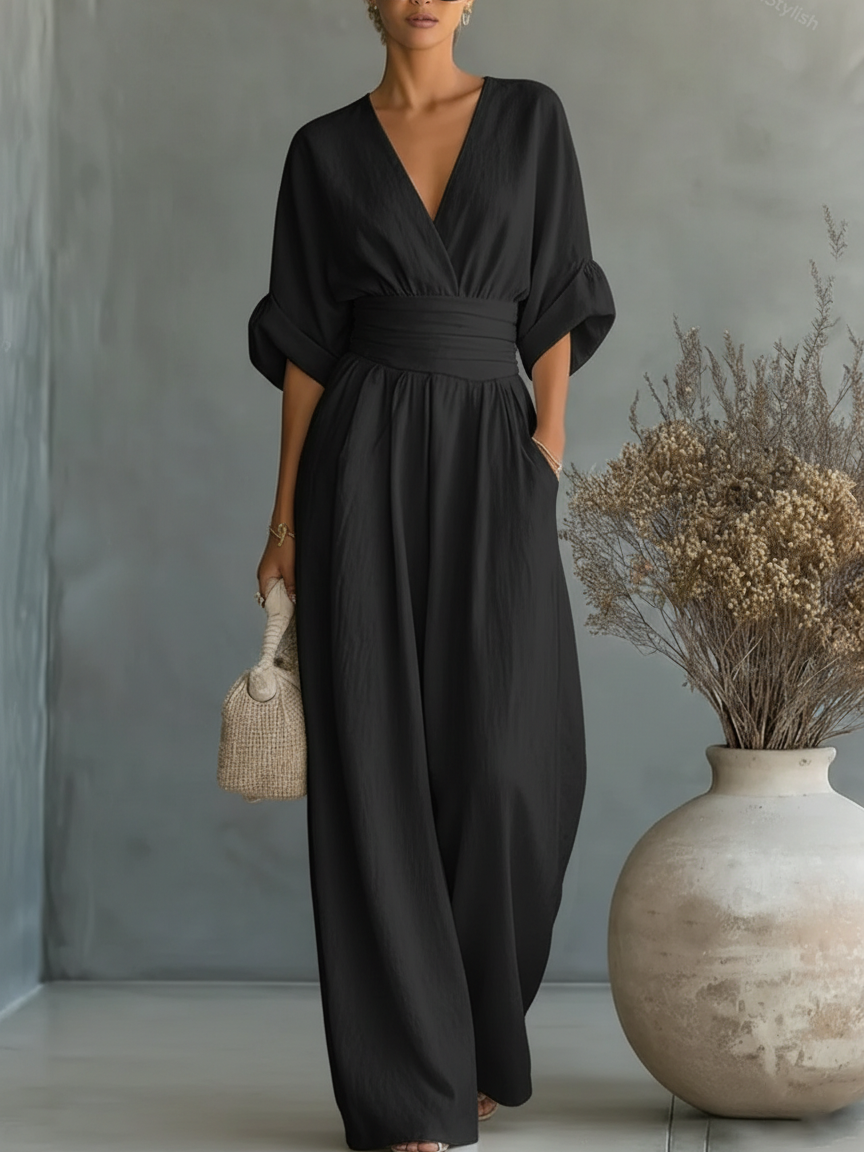 Mono elegante con escote en V y talle alto
