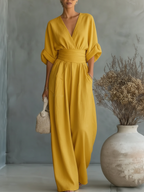 Mono elegante con escote en V y talle alto