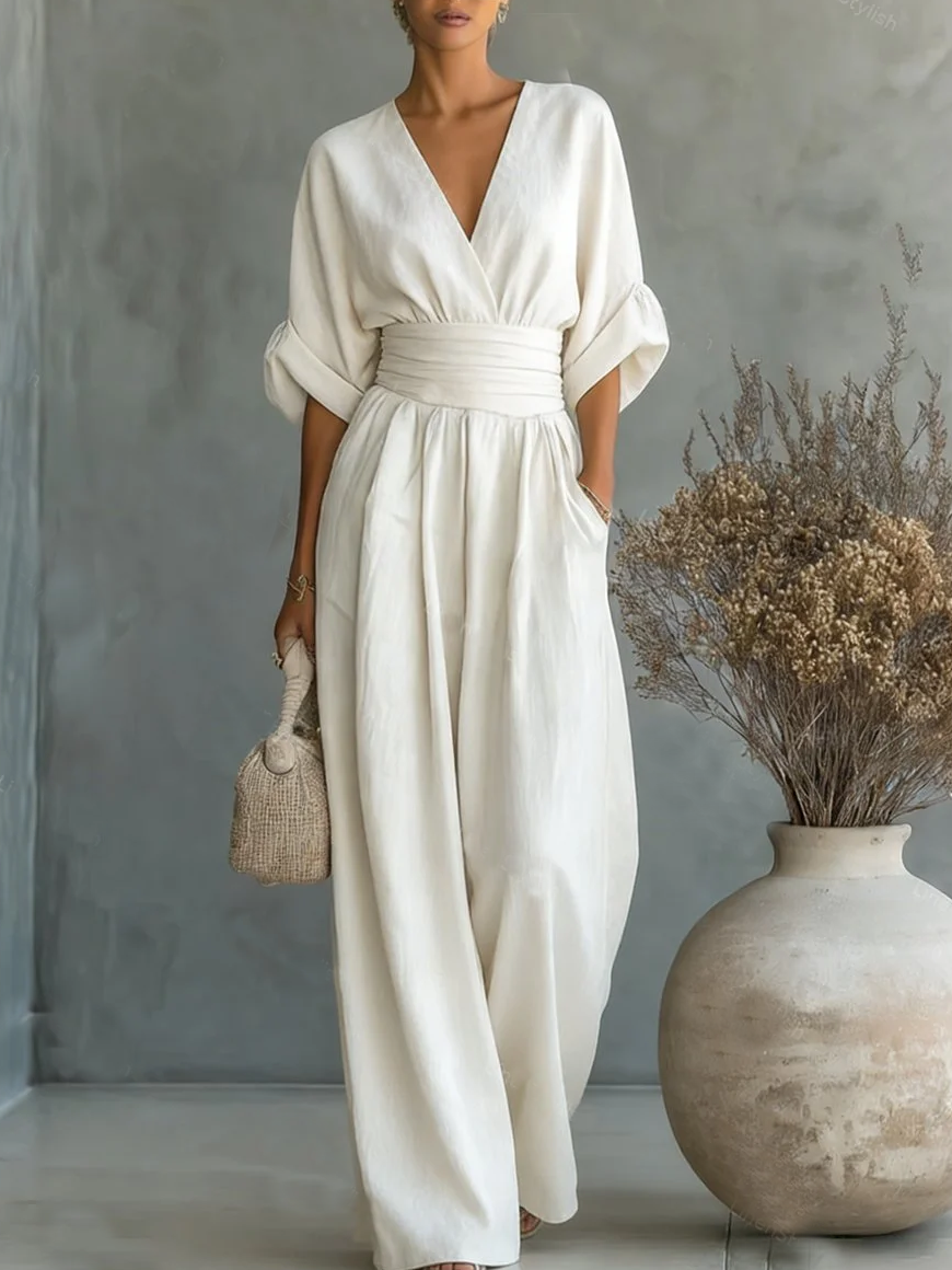 Mono elegante con escote en V y talle alto
