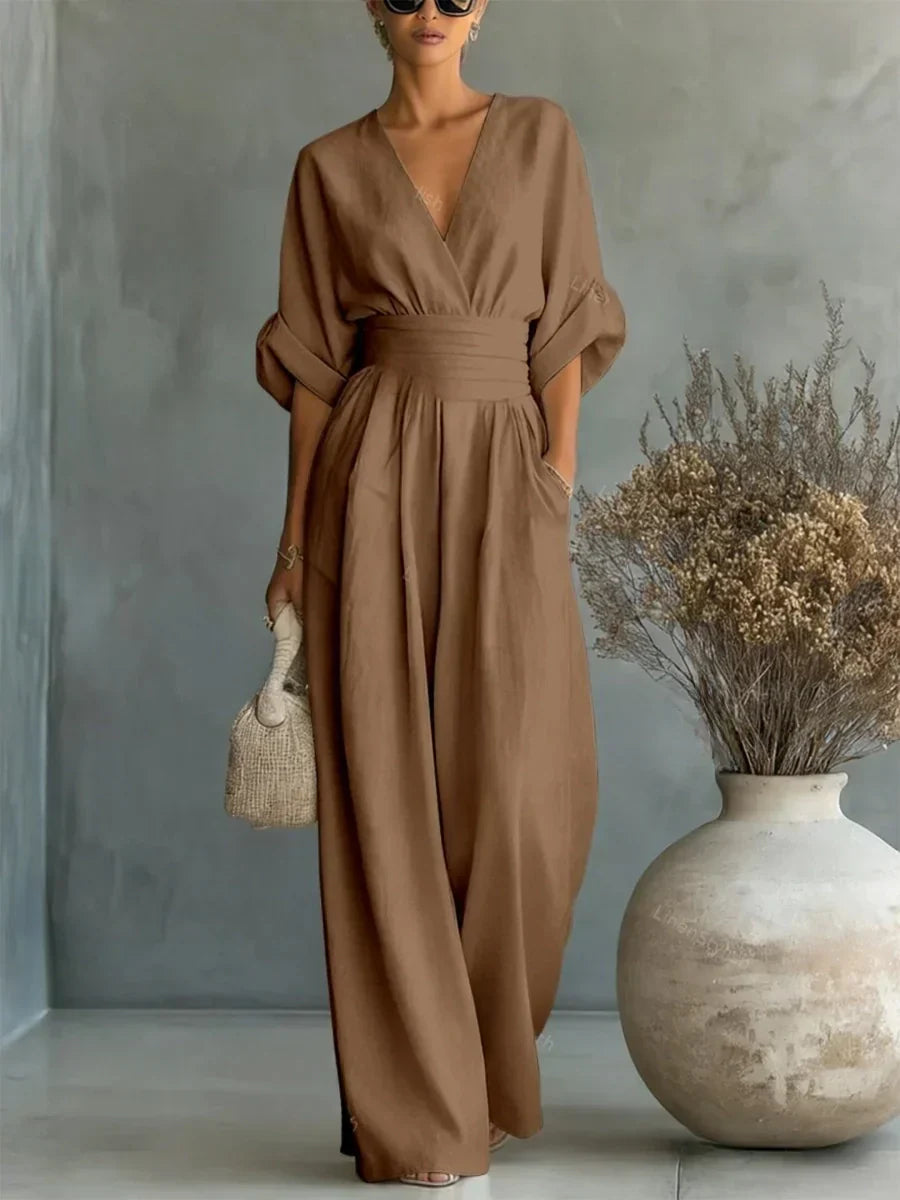 Mono elegante con escote en V y talle alto