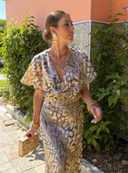 Covadonga • Vestido Midi Estampado Animal Print con Nudo Frontal
