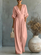 Mono elegante con escote en V y talle alto