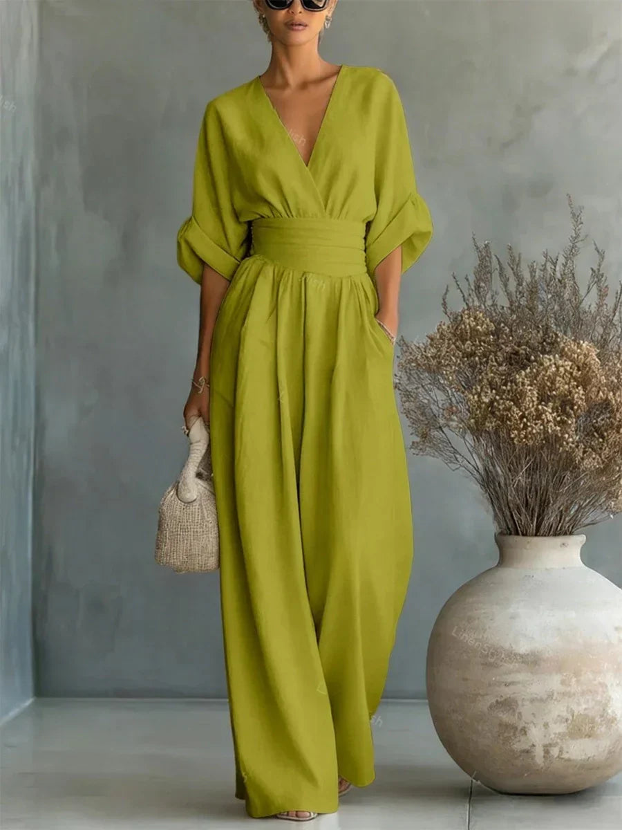 Mono elegante con escote en V y talle alto